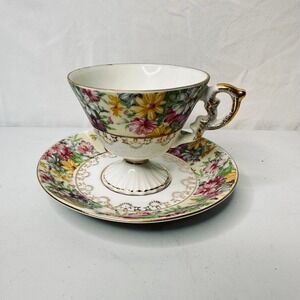 Vintage Enesco Japan Floral Chintz Footed Teacup and Saucer Set Gold Gilt Trim